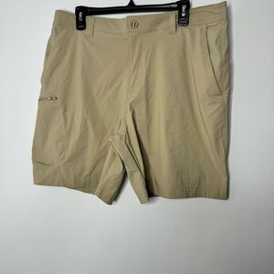 Under Armour tan shorts size 38